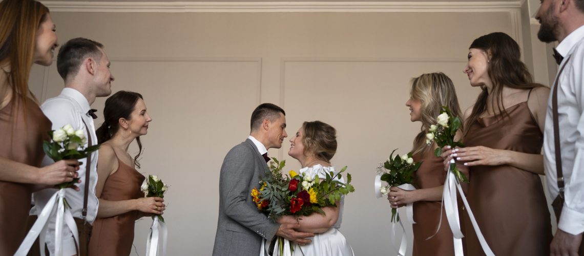 medium-shot-people-posing-wedding